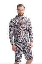 Explore our sustainable men's swimwear collection featuring a Zebra print beach t-shirt with hood and SPF35 protection. Designed for classic luxury and eco-friendly style, offering comfort and sun protection
