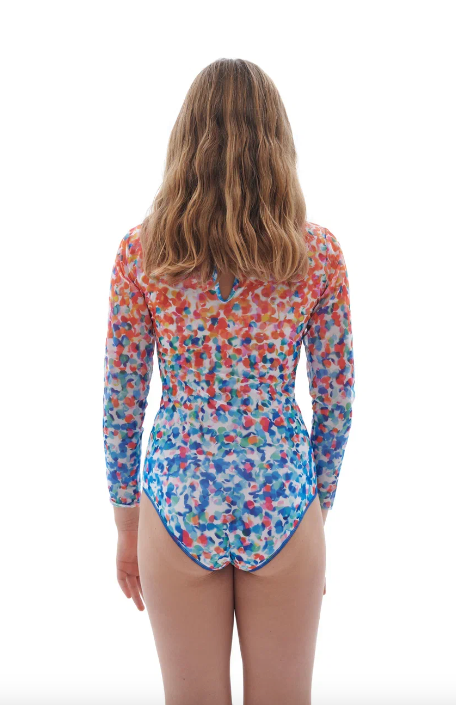 Explore our Confetti print kids swimsuits with sleeves, offering SPF35 protection for added safety. Designed for classic luxury and comfort, these eco-friendly swimsuits ensure your child enjoys stylish and safe beachwear. Shop now!