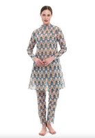 This file describes a tan-through, innovative, and sustainable burkini set with a Casablanca print. The set includes a top, leggings, and a tunic, offering classic luxury for modest fashion. The description also encourages people to shop for this stylish and eco-friendly swimwear.