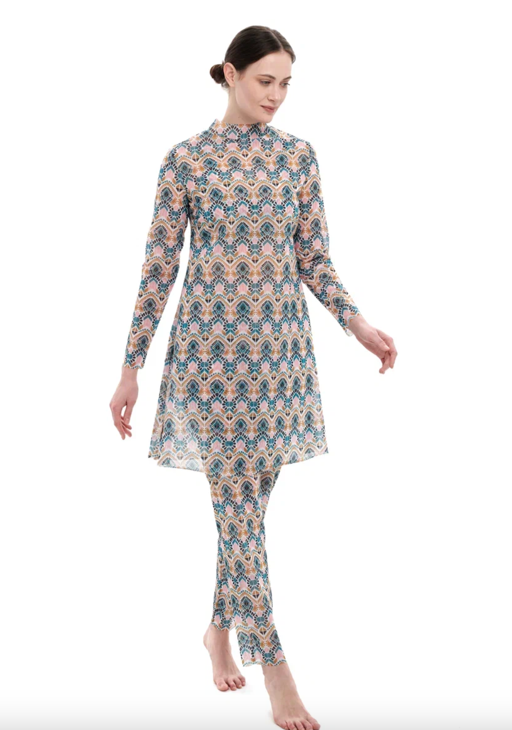 This file describes a tan-through, innovative, and sustainable burkini set with a Casablanca print. The set includes a top, leggings, and a tunic, providing classic luxury for modest fashion. The description also encourages people to shop for this stylish and eco-friendly swimwear.