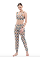 This file describes a tan-through, innovative, and sustainable burkini set with a Casablanca print. The set includes a top, leggings, and a tunic, providing classic luxury for modest fashion. The description also includes a call to action to shop for this stylish and eco-friendly swimwear.