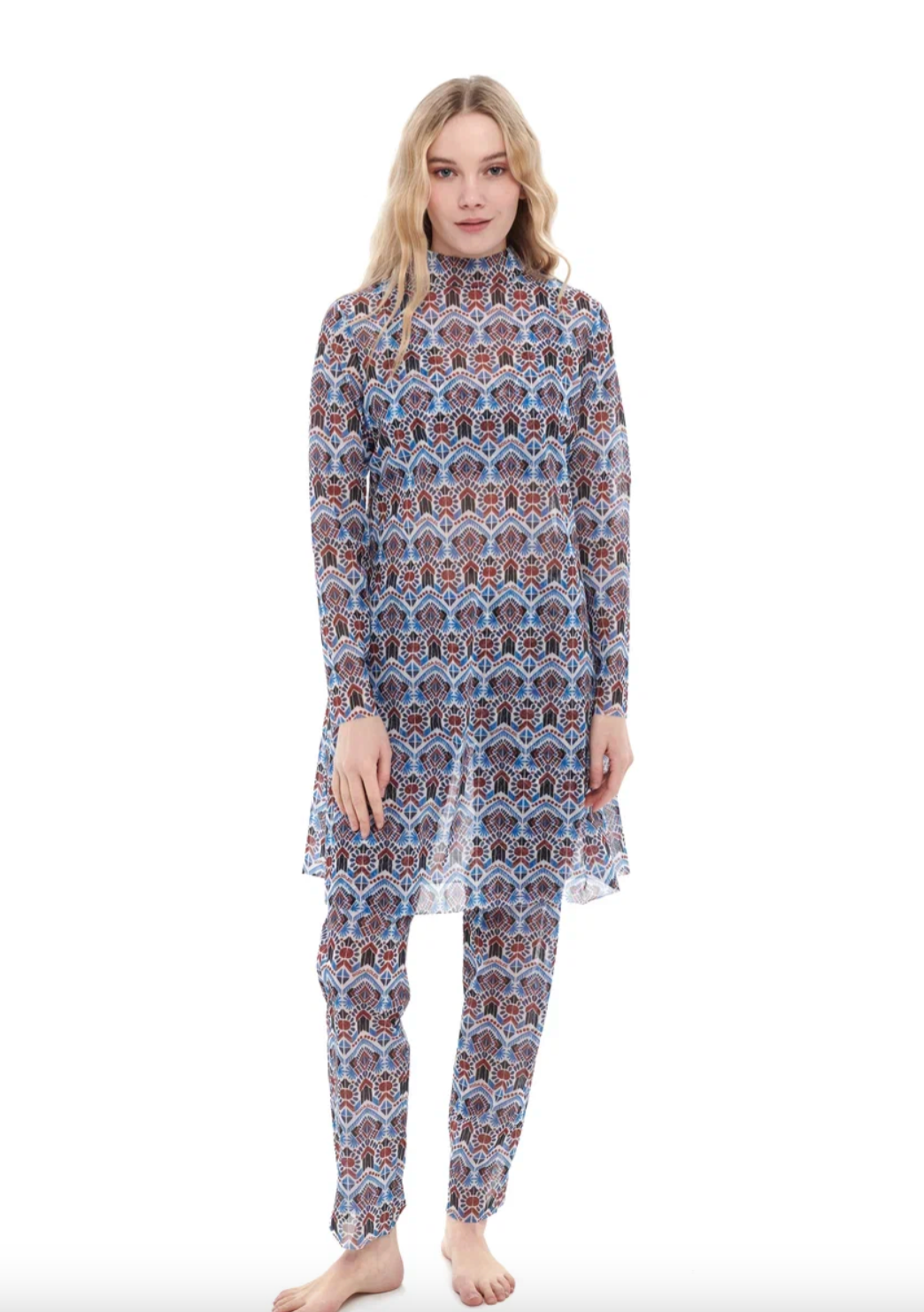 This file contains a description of a tan-through, innovative burkini set with a Marrakesh print. The sustainable set includes a top, leggings, and tunic, providing classic luxury for modest fashion. Shop now!