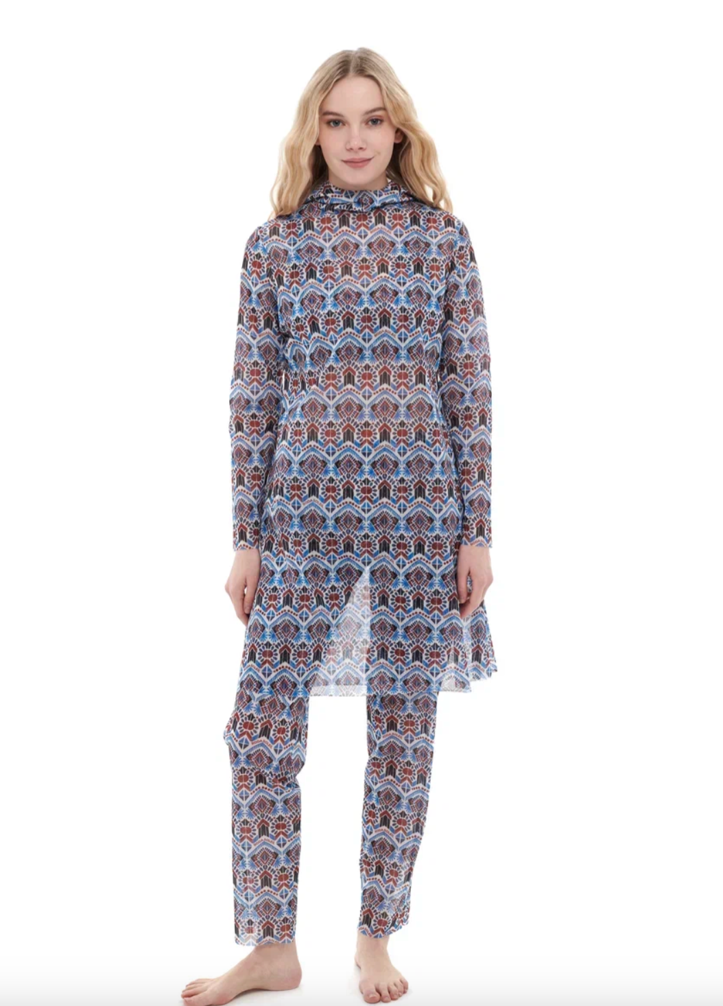 This file describes a tan-through, sustainable burkini set with a Marrakesh print. It includes a top, leggings, and a tunic, providing innovative, classic luxury for modest fashion. Shop now!