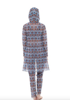 This file describes a tan-through burkini set with a Marrakesh print. The innovative, sustainable set includes a top, leggings, and tunic, offering classic luxury for modest fashion. Shop now!