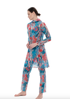 This file describes a sustainable, tan-through burkini set with a Seaunicorns print. The set includes a top, leggings, and tunic, offering classic luxury for modest fashion. Shop now!