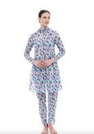 This file describes a Strelitzia print burkini set that is tan-through, innovative, and sustainable. The set includes a top, leggings, and tunic, offering classic luxury for modest fashion. Shop now