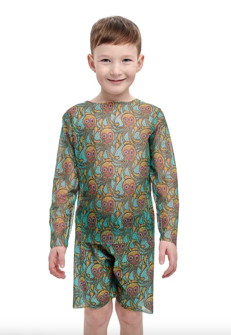 This file contains a description of a tan-through, innovative, sustainable kid's T-shirt and shorts set with an Octopus print. It offers classic luxury for modest fashion. Shop now!