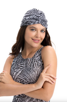 This file describes the FAKE ZEBRA print turban, which is one size fits all. It combines fashion and function, providing classic luxury for modest fashion. Encourages shopping now for stylish, eco-friendly headwear.