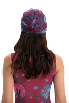 This file contains a description of the PEONIES print turban, featuring a one-size-fits-all design. It blends classic luxury and modest fashion. Encourages shopping now for stylish, eco-friendly headwear.