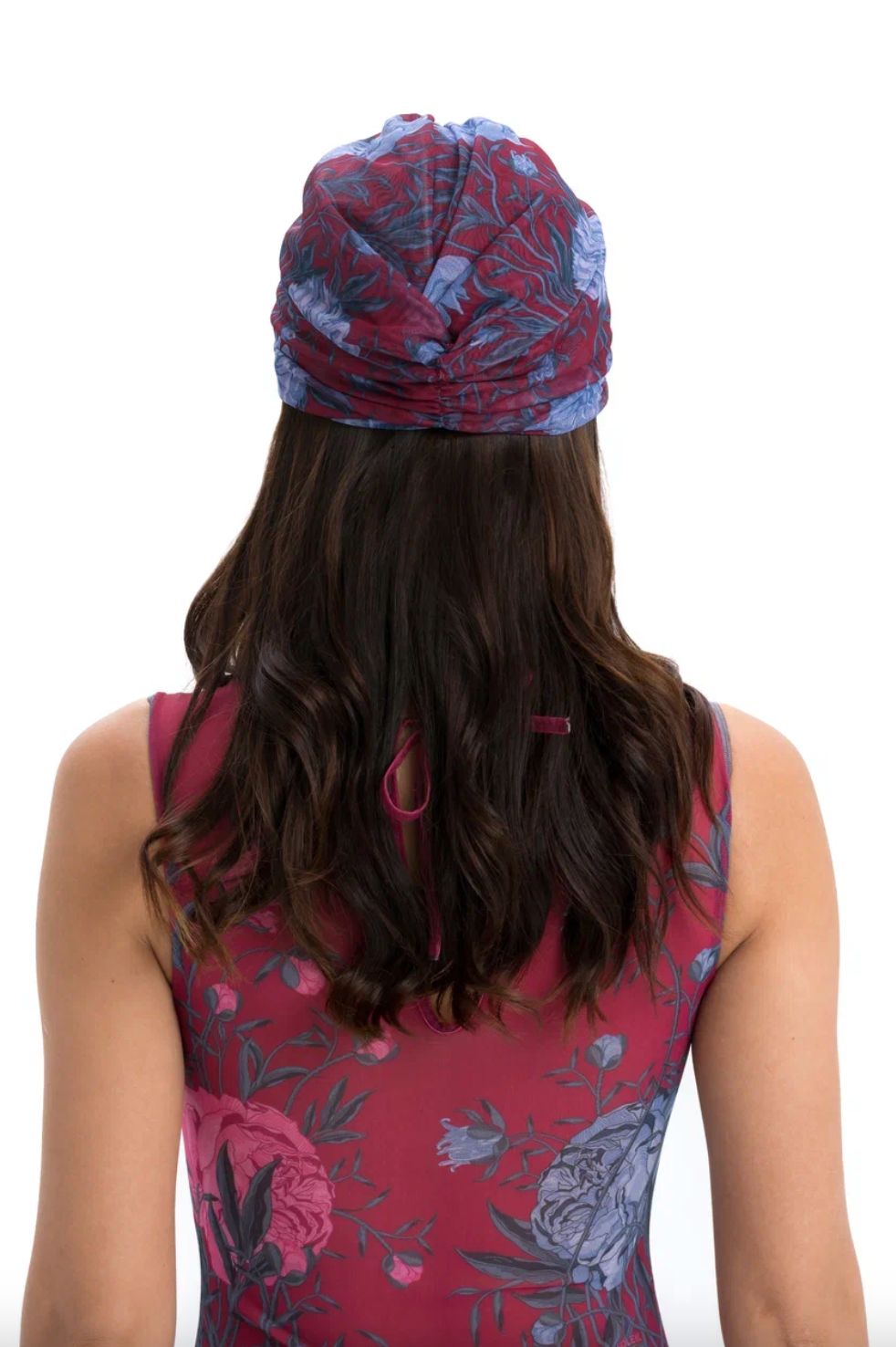 This file contains a description of the PEONIES print turban, featuring a one-size-fits-all design. It blends classic luxury and modest fashion. Encourages shopping now for stylish, eco-friendly headwear.