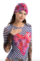 This file describes the STRIPES print turban, which is one size fits all. It combines fashion and function, providing classic luxury for modest fashion. Encourages shopping now for stylish, eco-friendly headwear.