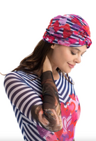 This file contains a description of a one-size-fits-all STRIPES print turban. It offers classic luxury for modest fashion and includes a call to action to shop now for elegant, eco-friendly headwear.