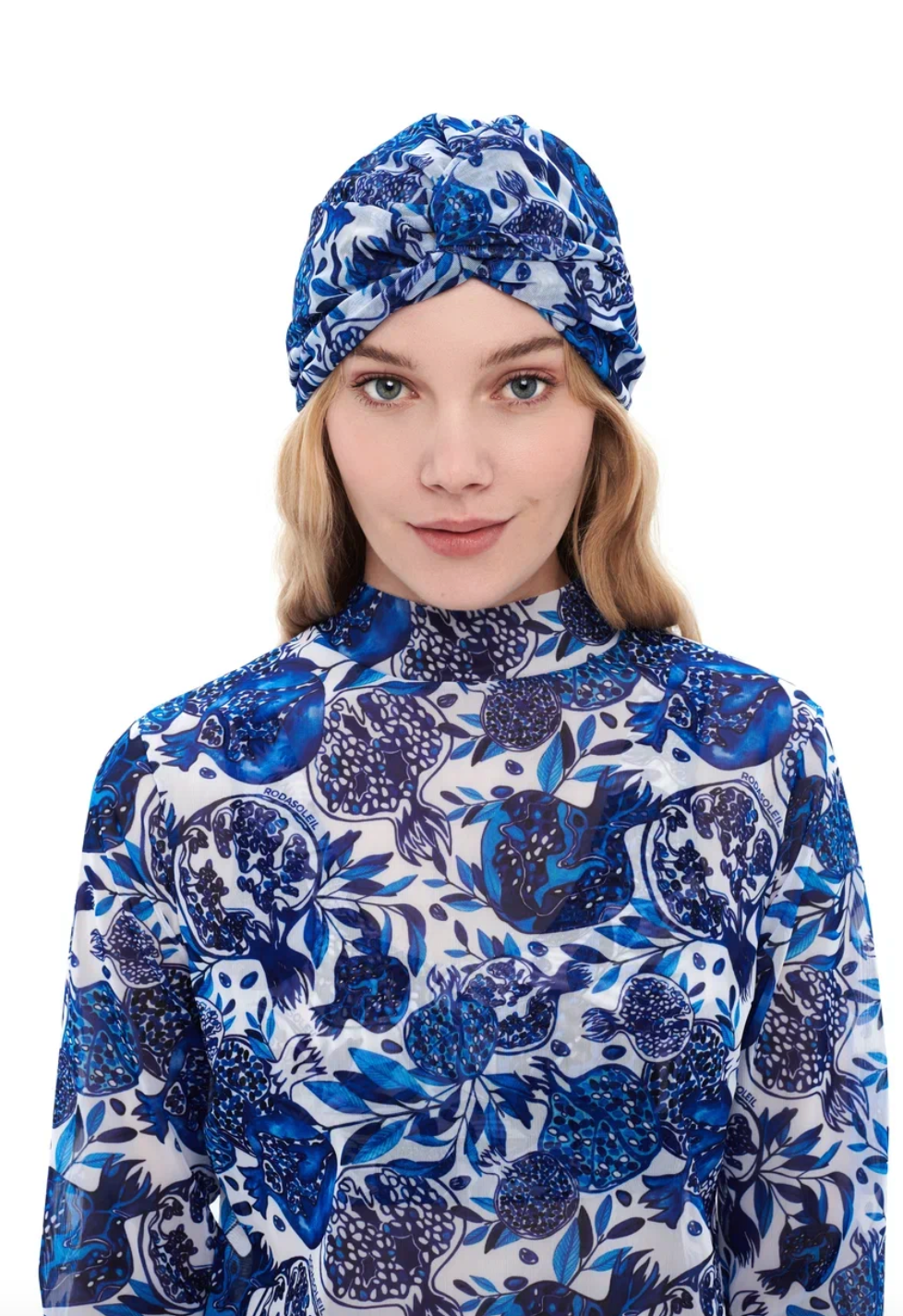 This file contains a description of the POMEGRANATE print turban, one size fits all. It offers classic luxury for modest fashion and includes a call to action to shop now for elegant, eco-friendly headwear.