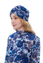 This file describes the POMEGRANATE print turban, which is one size fits all. It combines fashion and function, providing classic luxury for modest fashion. Encourages shopping now for stylish, eco-friendly headwear.