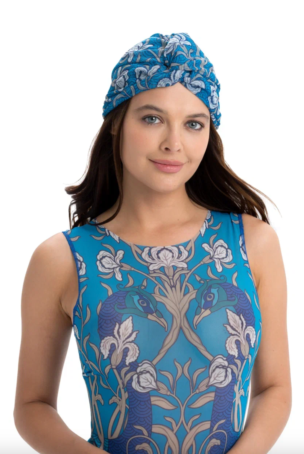 This file contains a description of the SWANS print turban, one size fits all. It offers classic luxury for modest fashion and includes a call to action to shop now for elegant, eco-friendly headwear.