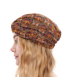 This file describes the ETHNIC print turban, featuring a one-size-fits-all design. It blends classic luxury and modest fashion. Encourages shopping now for stylish, eco-friendly headwear.