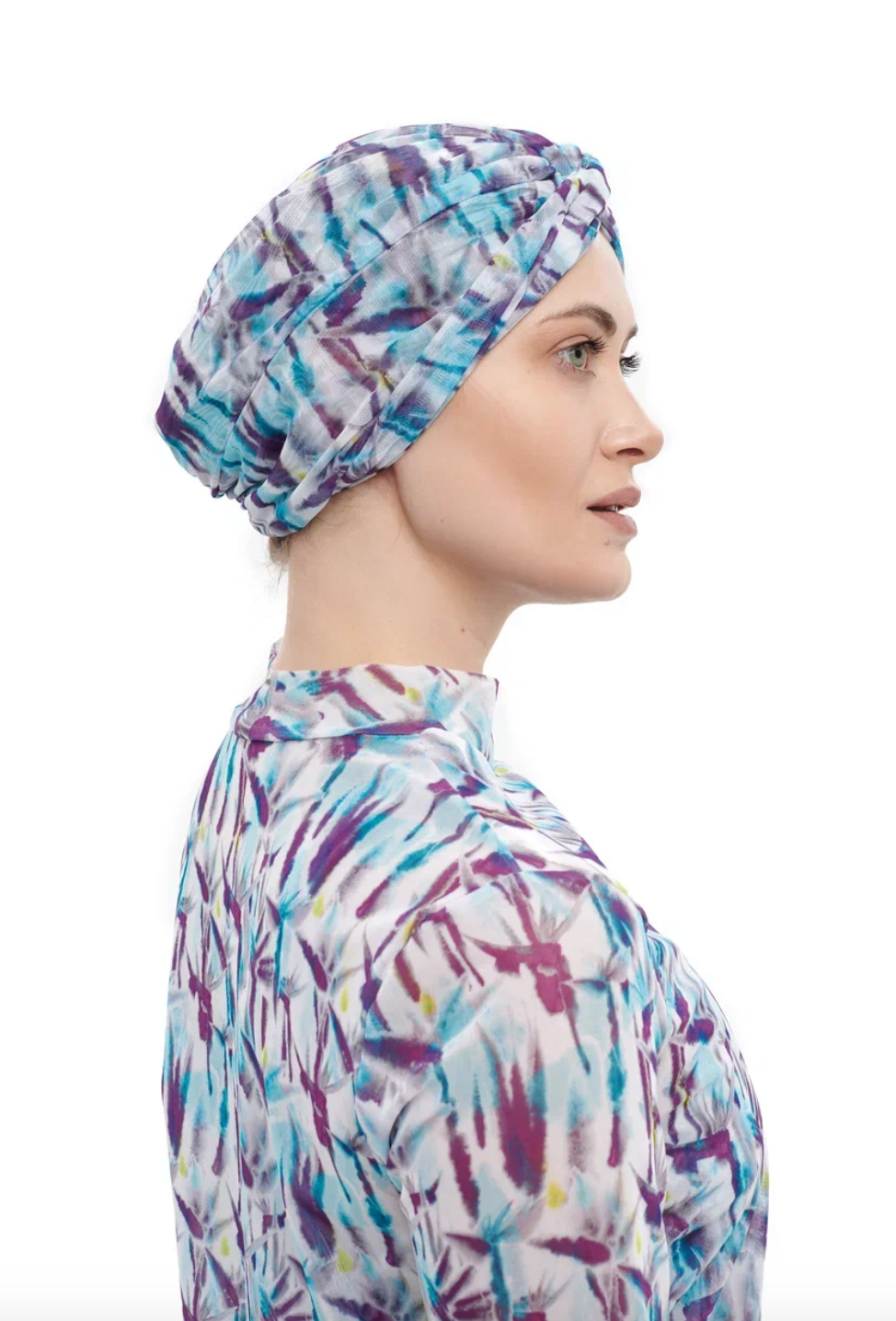 This file contains a description of a one-size-fits-all STRELITZIA print turban. It offers classic luxury for modest fashion and includes a call to action to shop now for elegant, eco-friendly headwear.