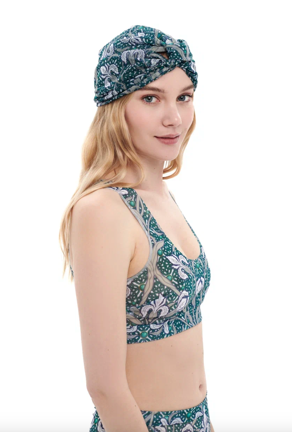 This file describes the IRISES print turban, which is one size fits all. It provides classic luxury for modest fashion and encourages shopping now for elegant, eco-friendly headwear.