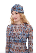 This file contains a description of a one-size-fits-all MARAKKESH print turban. It offers classic luxury for modest fashion and includes a call to action to shop now for elegant, eco-friendly headwear.