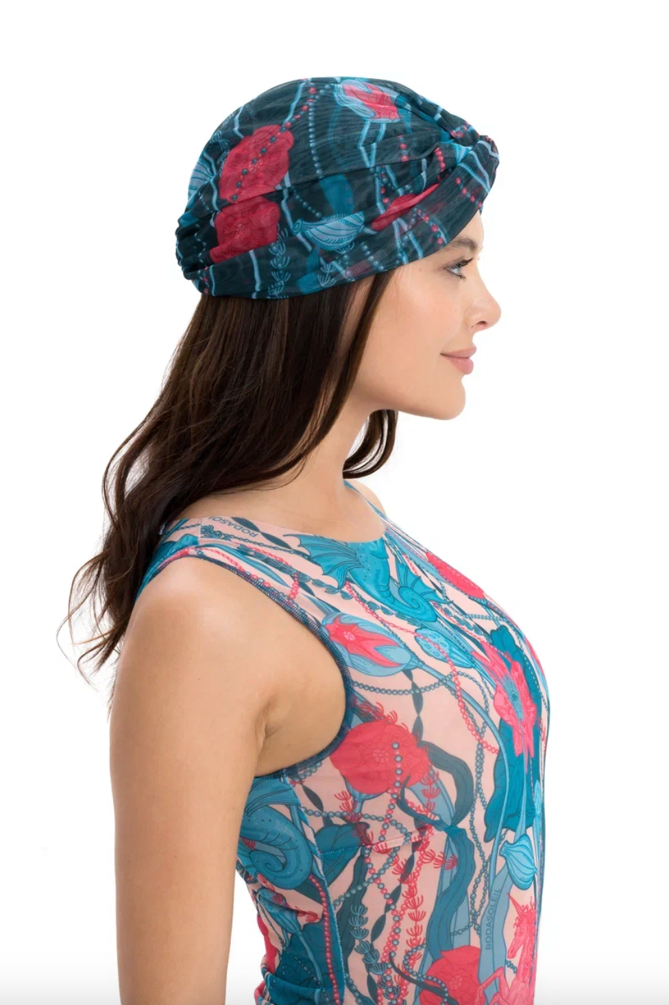 This file contains a description of a one-size-fits-all SEAUNICORNS print turban. It offers classic luxury for modest fashion and includes a call to action to shop now for elegant, eco-friendly headwear.