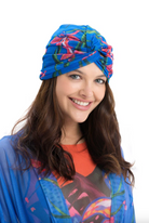 This file contains a description of the LILY print turban, one size fits all. It offers classic luxury for modest fashion and includes a call to action to shop now for elegant, eco-friendly headwear.