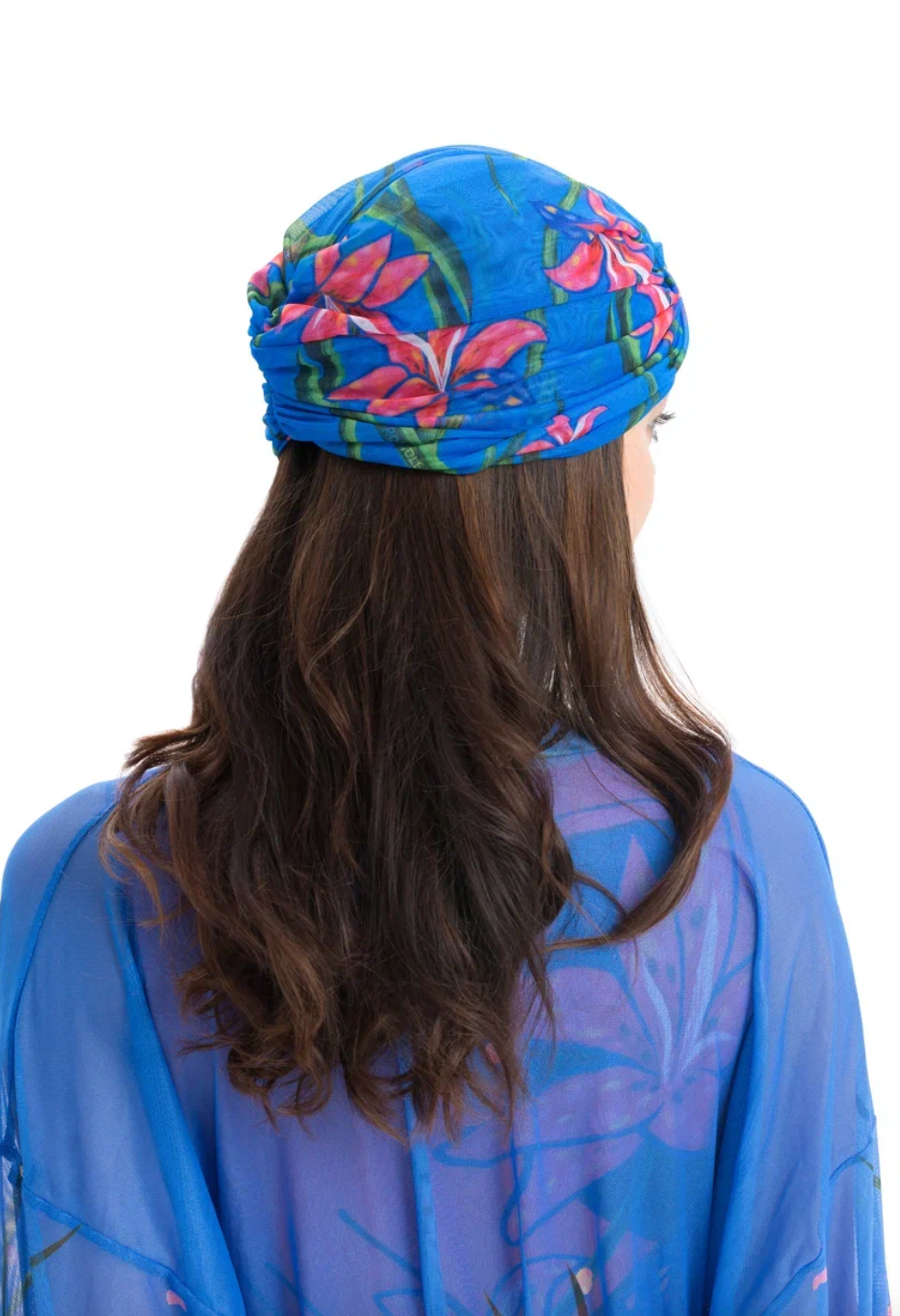 This file describes the LILY print turban, featuring a one-size-fits-all design. It blends classic luxury and modest fashion. Encourages shopping now for stylish, eco-friendly headwea