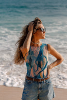 This file showcases sustainable tan-through smart swimsuits featuring a stylish Jellyfish print. Included are sleeveless one-pieces offering SPF35 protection, embodying luxury beachwear.